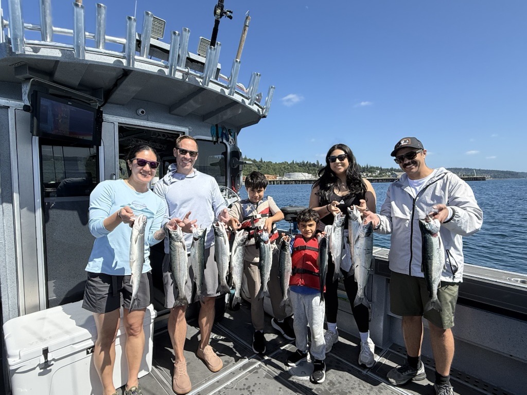 Fresh coho salmon catch on Puget Sound — June 20, 2026 guided salmon fishing trip with CNH Sportfishing Charters Seattle